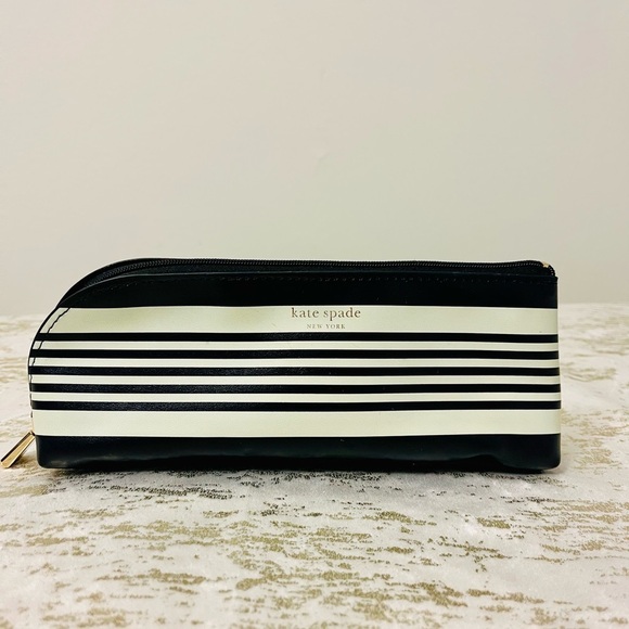 kate spade Handbags - kate spade Black and White Striped Makeup Pouch with Gold Zip